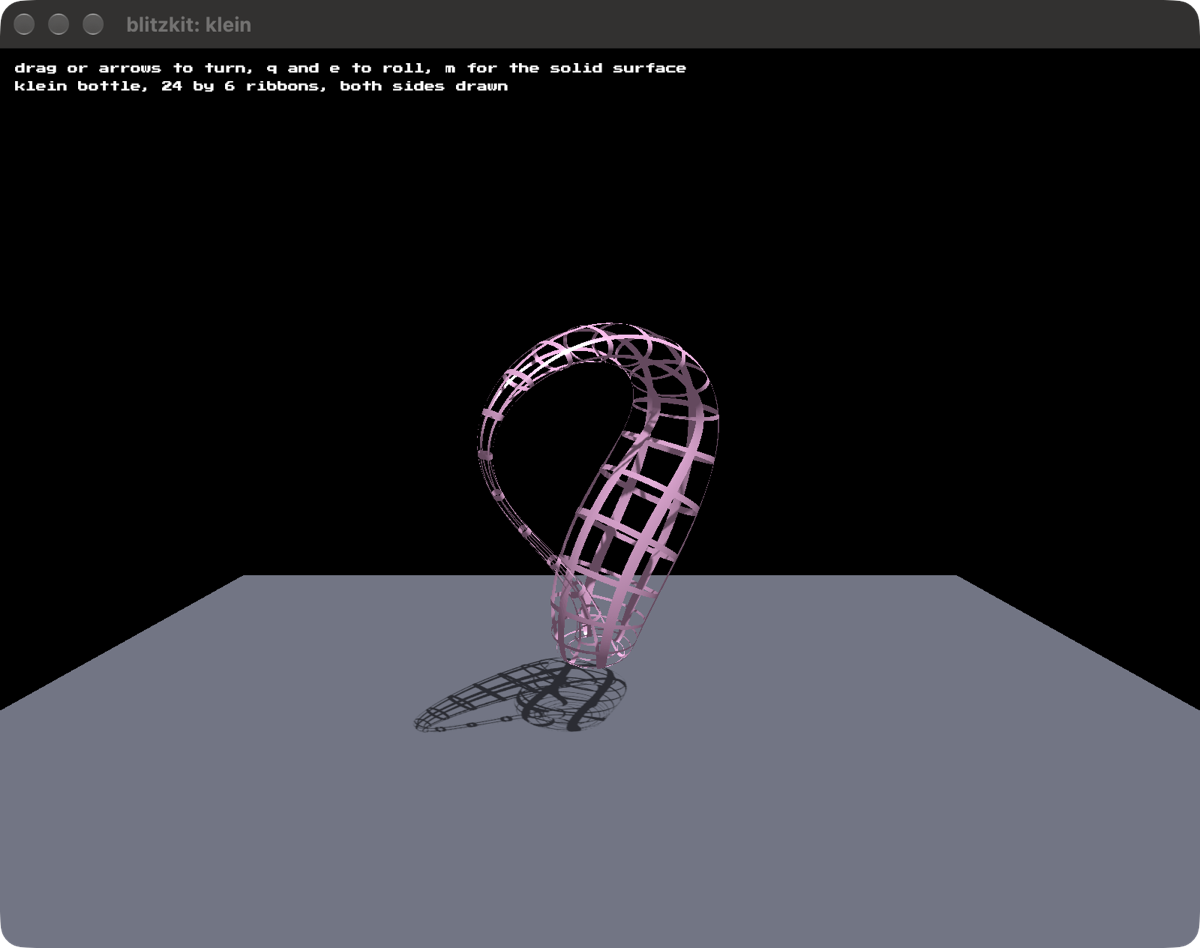 A Klein bottle as a wire mesh, its neck curving over and back down into its
body, casting a lattice shadow